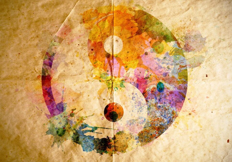 Watercolor yin yang symbol, old paper background Watercolor yin yang symbol on old paper background